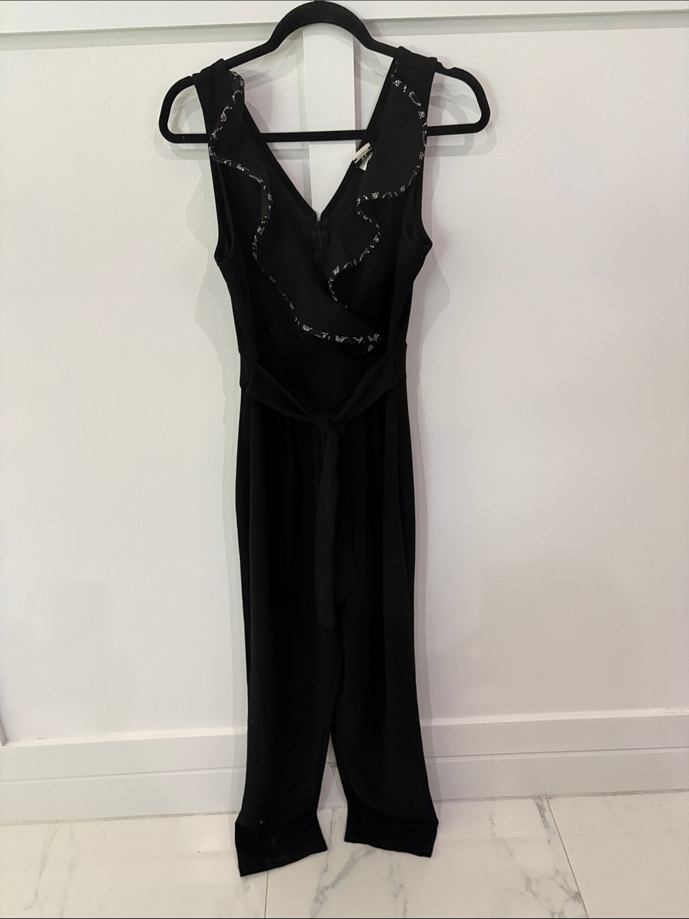 Wrapper Black Sleeveless Jumpsuit with Ruffle Detail